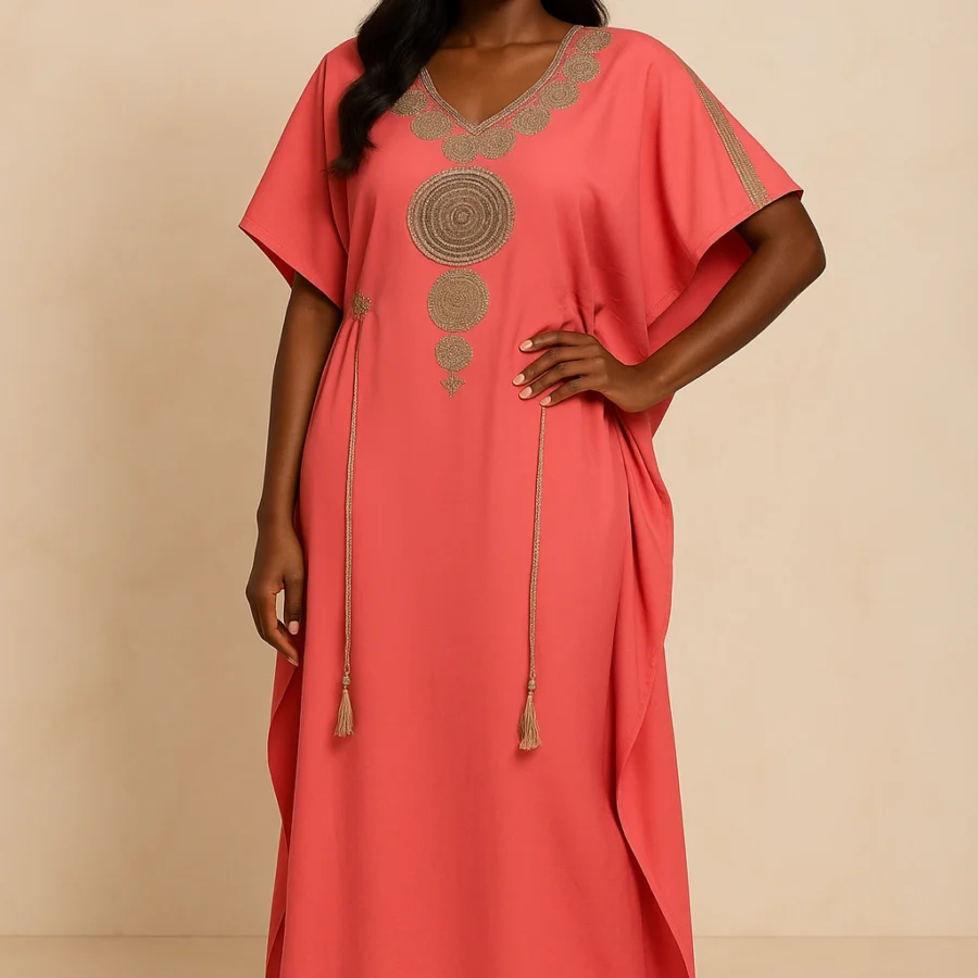 Caftan rose doux brodé or – tenue raffinée d’inspiration marocaine pour femme africaine