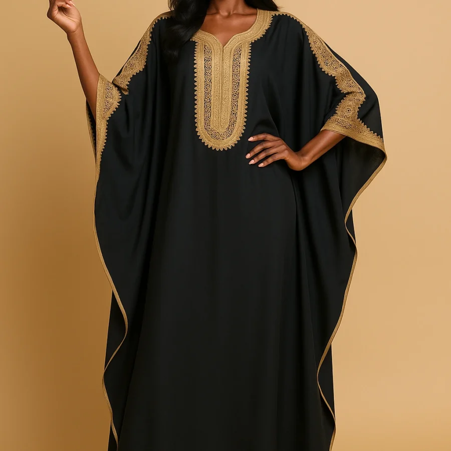 Caftan marocain noir orné d’une broderie artisanale dorée, coupe papillon sophistiquée - Le Caftanier